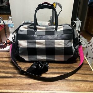 Isaac Mizrahi black and white checker with pink accent duffle bag